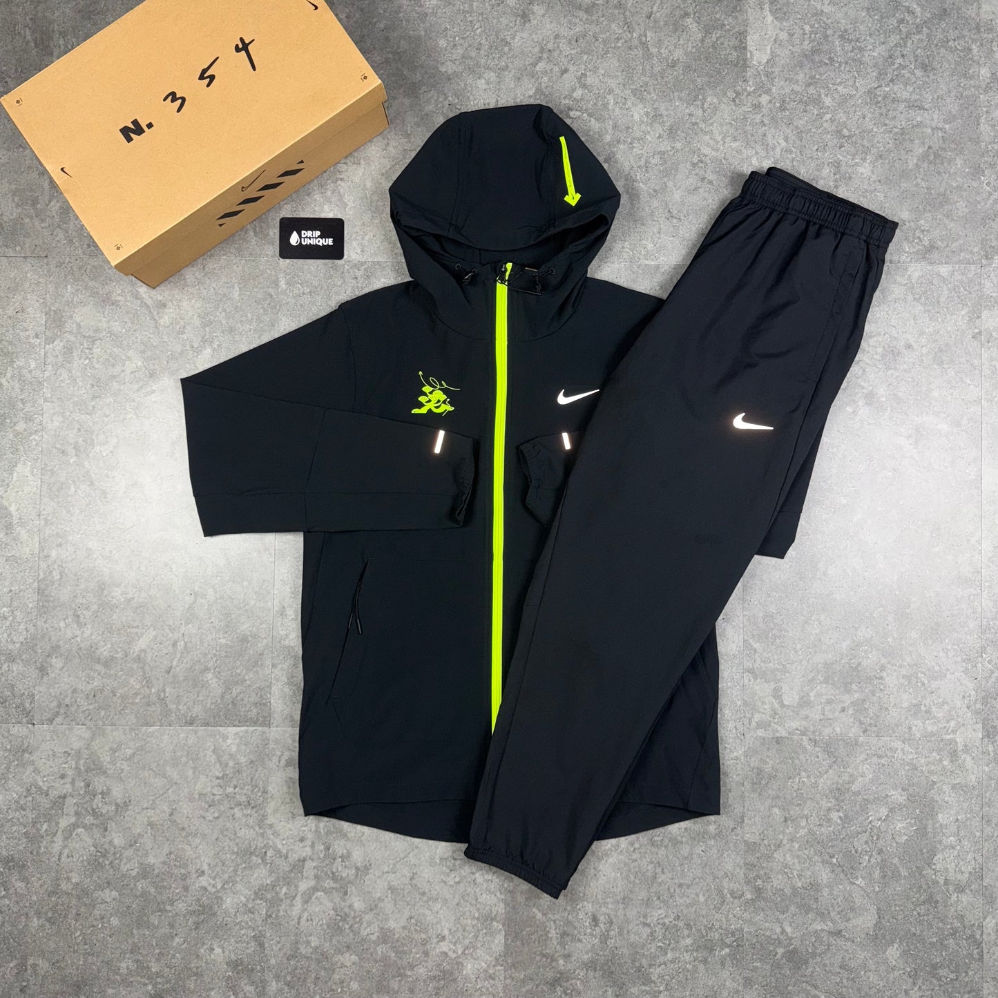 Nike Repel “Just Do It” Windrunner Jacket Black & Black Nike Challenger Pants Set