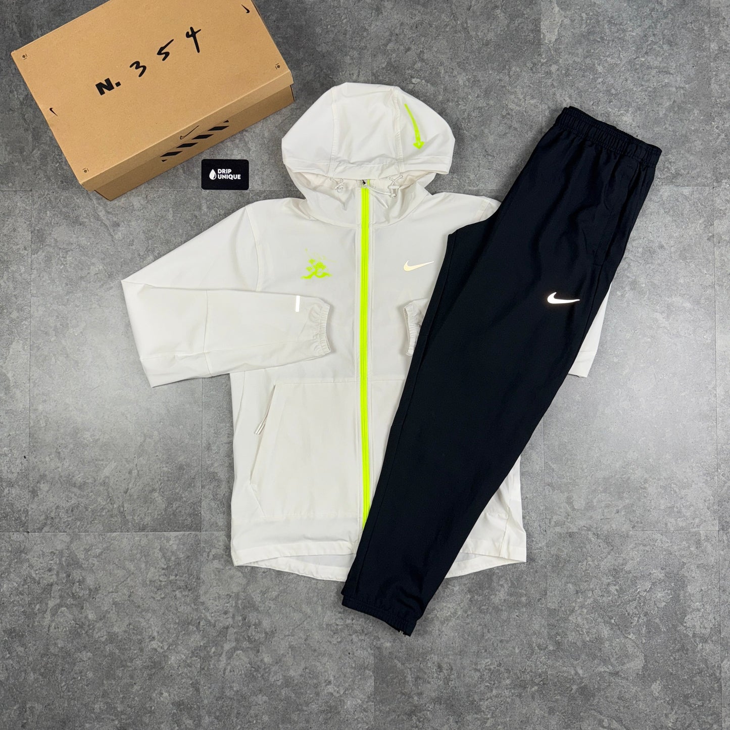 Nike Repel “Just Do It” Windrunner Jacket White & Black Nike Challenger Pants Set