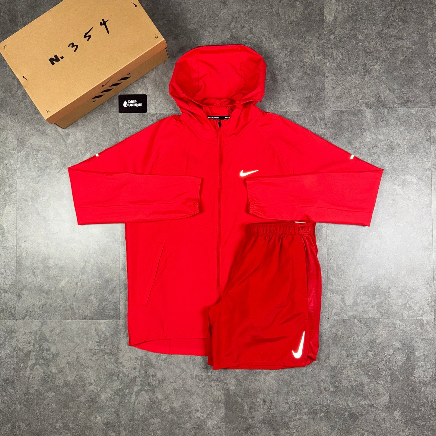 Nike Repel Miler Windrunner Jacket University Red & Red Challenger Shorts Set